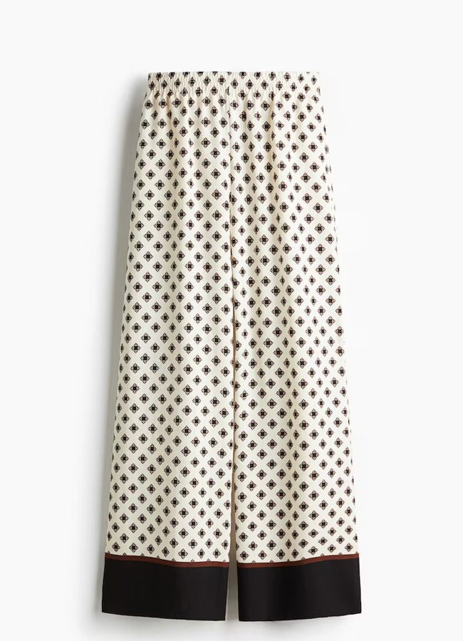Plačios „H&M“ spausdintos kelnės.
