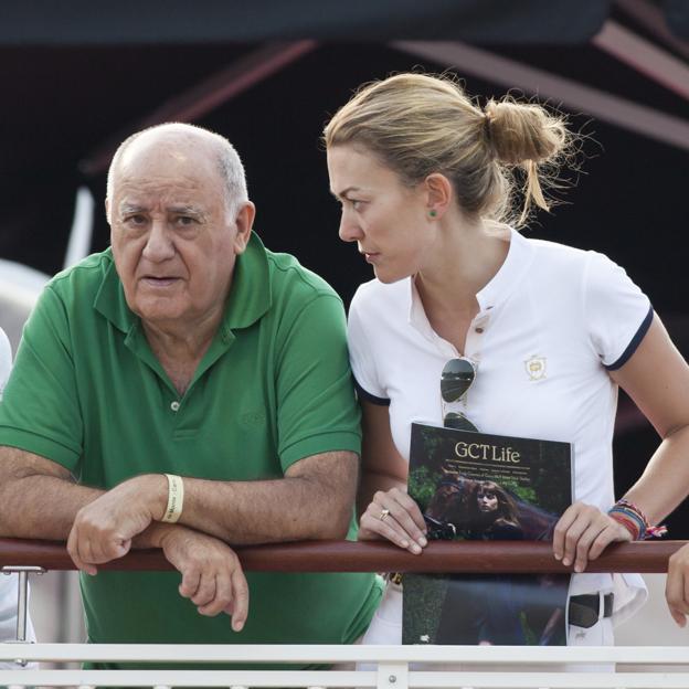 Amancio ir Marta Ortega, „Complictict Talk“ akimirką. 