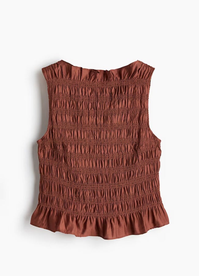 „H&M“ rankovių viršus.